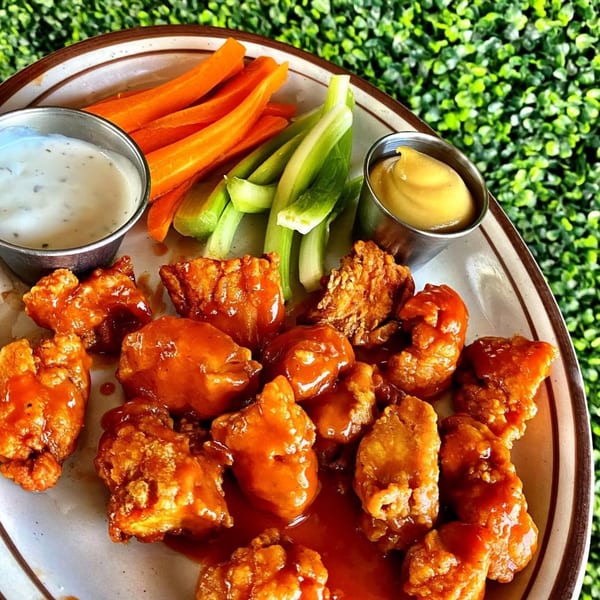 Eat'n Park's boneless buffalo wings with ranch, honey mustard, carrots, and celery sticks.